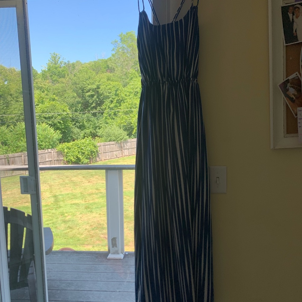 Very versatile, fully lined, Banana Republic navy blue with white stripes.